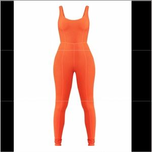 Orange Ribbed Jumpsuit by WaydaminBrand